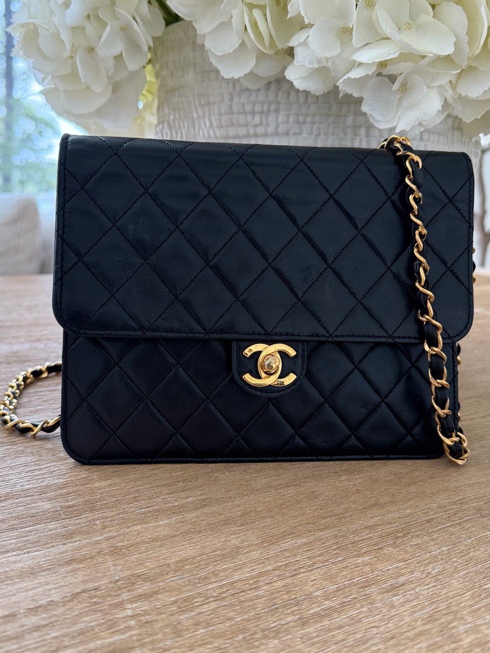 CHANEL Black Quilted Lambskin Crossbody Bag with Gold Hardware